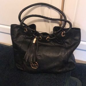 MK black leather shoulder bag